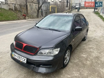 Авто Mitsubishi Lancer 2002 № 8636617
