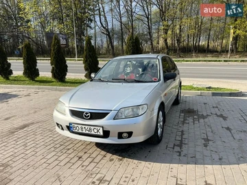 Авто Mazda 323 2002 № 8713022