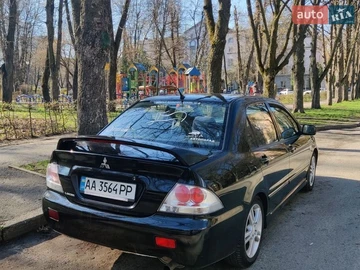 Авто Mitsubishi Lancer 2004 № 8794225