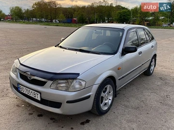 Авто Mazda 323 2000 № 8801877