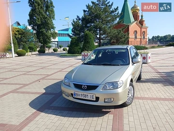 Авто Mazda 323 2003 № 8908319