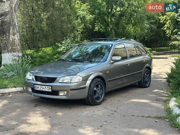 Авто Mazda 323 1999 № 8939615