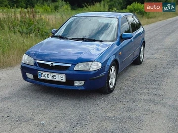Авто Mazda 323 1999 № 8949080