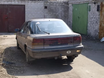 Авто Mitsubishi Lancer 1990 № 7190672