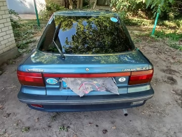 Авто Mitsubishi Lancer 1990 № 7316791