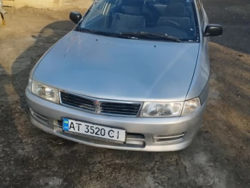Авто Mitsubishi Lancer 1998 № 7400024
