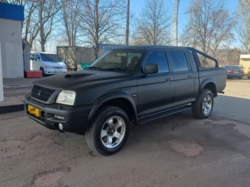 Авто Mitsubishi L 200 2003 № 7498854