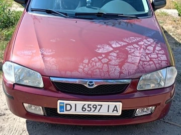 Авто Mazda 323 1999 № 7935471
