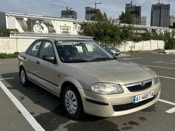 Авто Mazda 323 1999 № 7936483