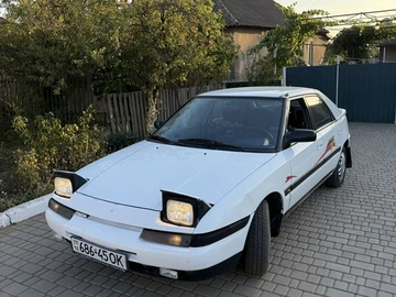 Авто Mazda 323 1990 № 7936660