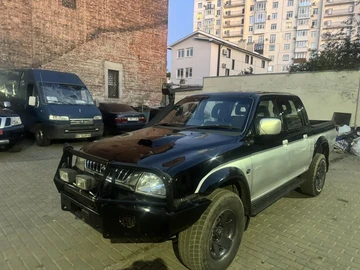Авто Mitsubishi L 200 2004 № 7937164