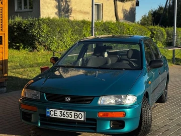 Авто Mazda 323 1996 № 7938134