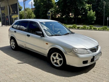 Авто Mazda 323 2002 № 7938620