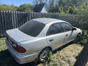 Авто Mazda 323 1997 № 7941371