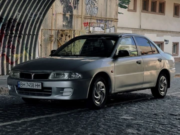 Авто Mitsubishi Lancer 1999 № 7956711