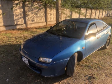 Авто Mazda 323 1997 № 7957634