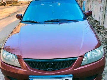 Авто Mazda 323 2003 № 7964157