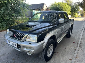 Авто Mitsubishi L 200 2004 № 7977774