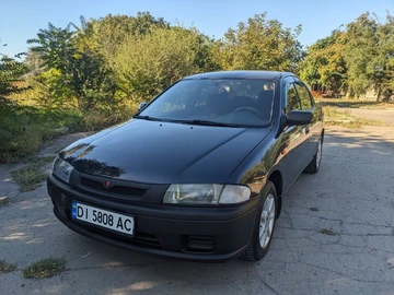Авто Mazda 323 1998 № 7985574