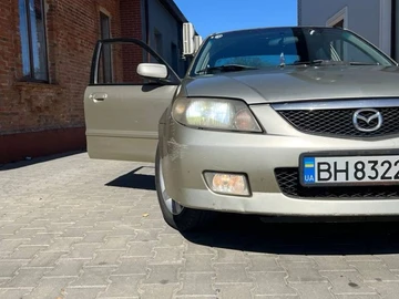 Авто Mazda 323 2003 № 7986084