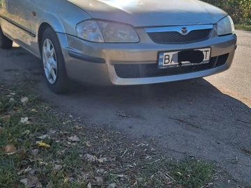 Авто Mazda 323 1999 № 7987144