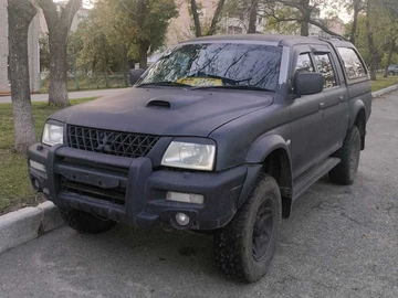 Авто Mitsubishi L 200 2002 № 7990178