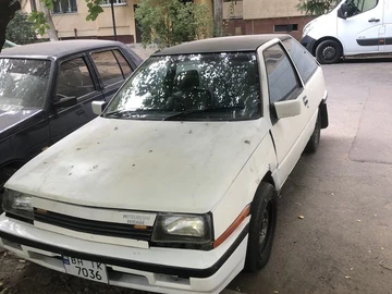 Авто Mitsubishi Mirage 1986 № 8004531