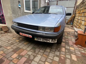 Авто Mitsubishi Lancer 1990 № 8031003