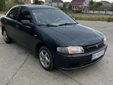 Авто Mazda 323 1997 № 8031347
