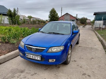 Авто Mazda 323 2002 № 8034564