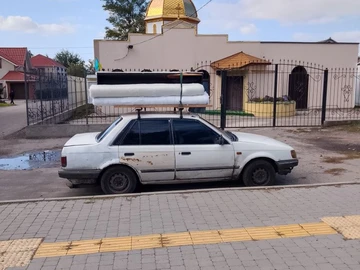Авто Mazda Familia 1990 № 8042766