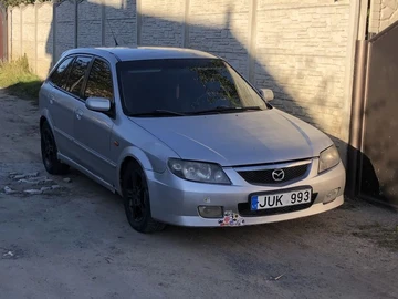 Авто Mazda 323 2002 № 8054997