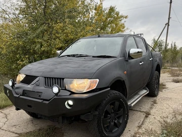 Авто Mitsubishi L 200 2009 № 8057604