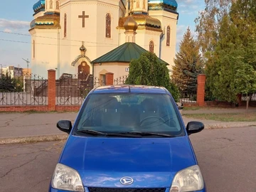 Авто Daihatsu Cuore 2004 № 8061027