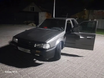 Авто Mazda 323 1997 № 8068672