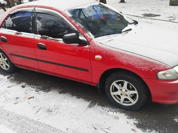Авто Mazda 323 1997 № 8069836
