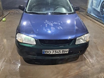 Авто Mazda 323 2000 № 8070063