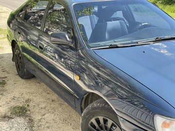 Авто Toyota Carina E 1992 № 8074383