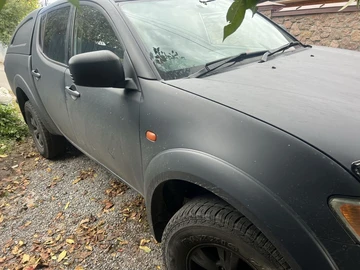 Авто Mitsubishi L 200 2009 № 8087995