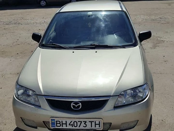 Авто Mazda 323 2002 № 8090731