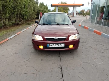 Авто Mazda 323 1999 № 8093603