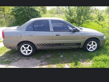 Авто Mitsubishi Lancer 1996 № 8096466