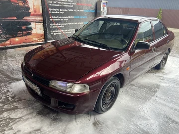 Авто Mitsubishi Lancer 1997 № 8101172