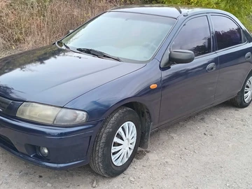 Авто Mazda 323 1998 № 8107597
