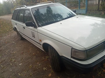 Авто Nissan Bluebird 1988 № 8110298