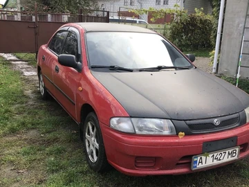 Авто Mazda 323 1997 № 8111674