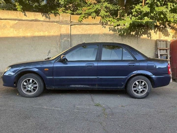 Авто Mazda 323 2001 № 8119909