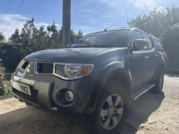 Авто Mitsubishi L 200 2009 № 8123176