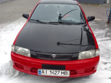 Авто Mazda 323 1997 № 8130803
