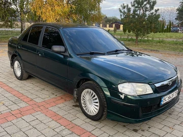 Авто Mazda 323 2000 № 8133629